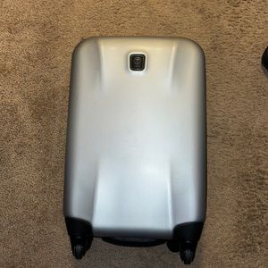 T tech by Tumi carry on hard shell luggage